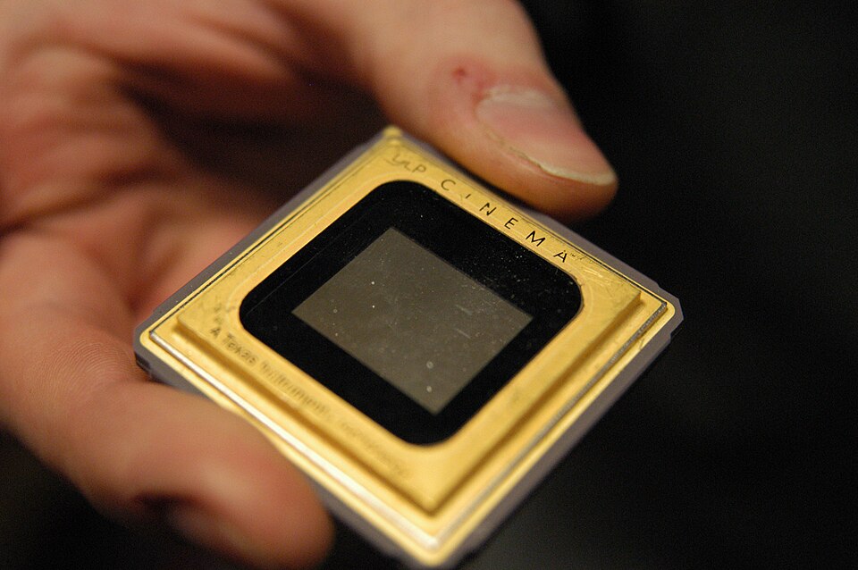 Close-up of a Digital Micromirror Device (DMD) chip used in DLP projectors