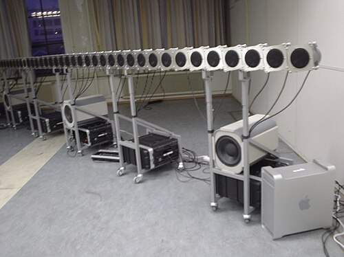 Wave field synthesis speaker array installation